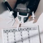Image of a diabetes management kit including a glucometer, syringes, and monitoring chart.