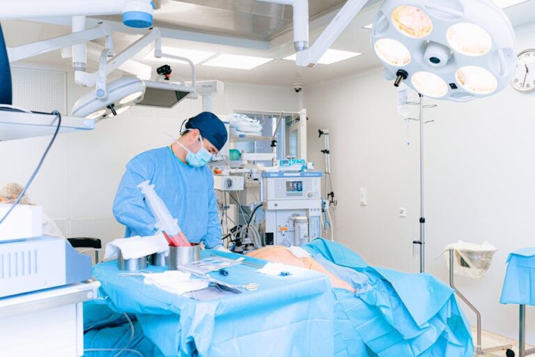 Experienced surgeon performing a procedure in a well-equipped operating room.