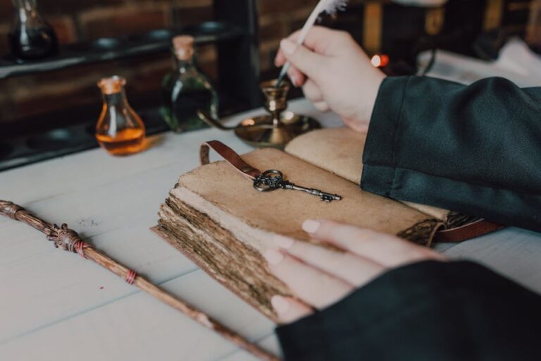 Mystical setup with a quill, spell book, and magical potions.